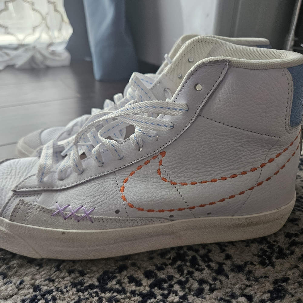White and Orange High-Top Sneakers